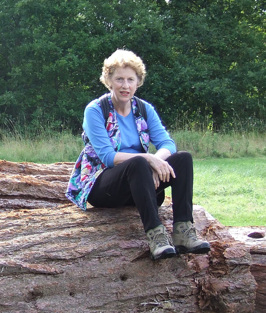 Molly Tabram sitting on a fallen tree circa 2006